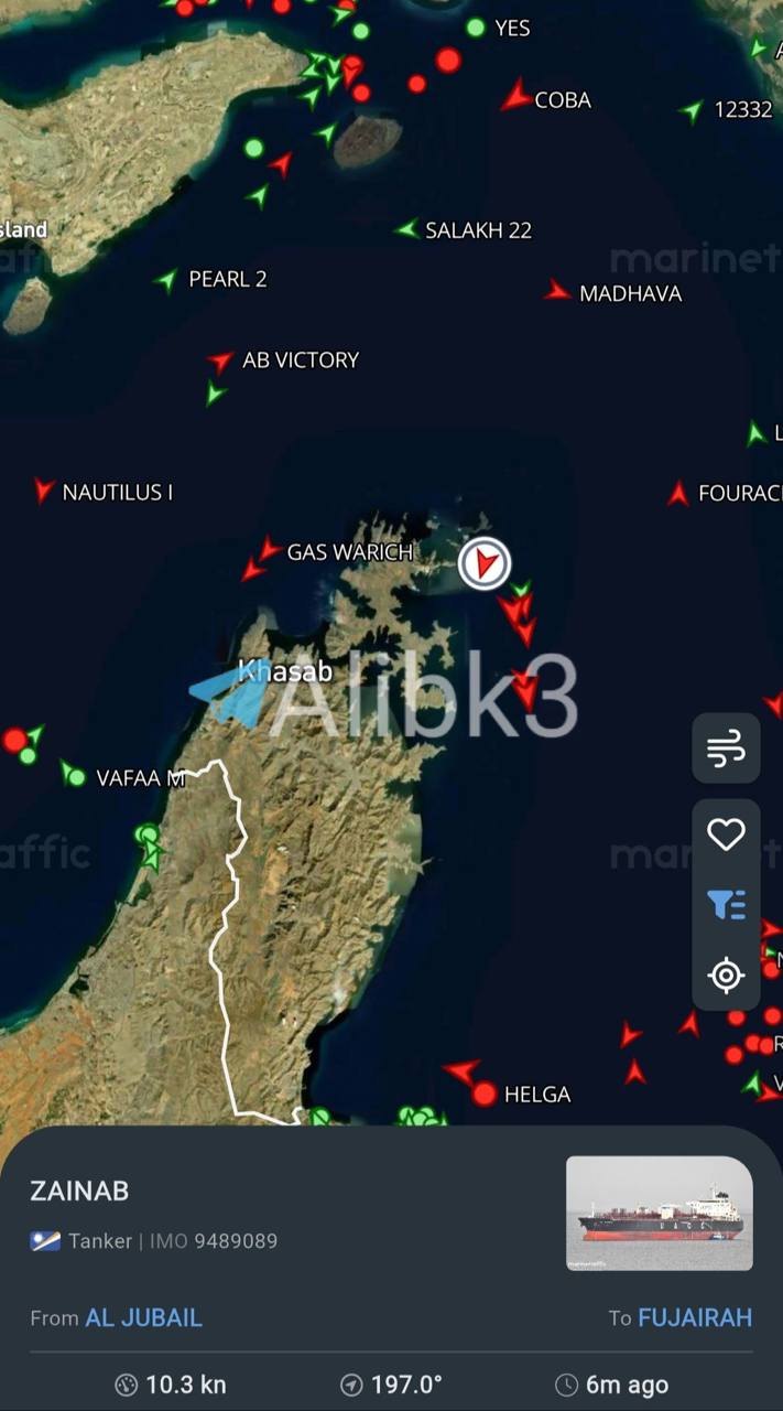 US‑protected tankers navigate south corridor of Hormuz; one veers toward Oman